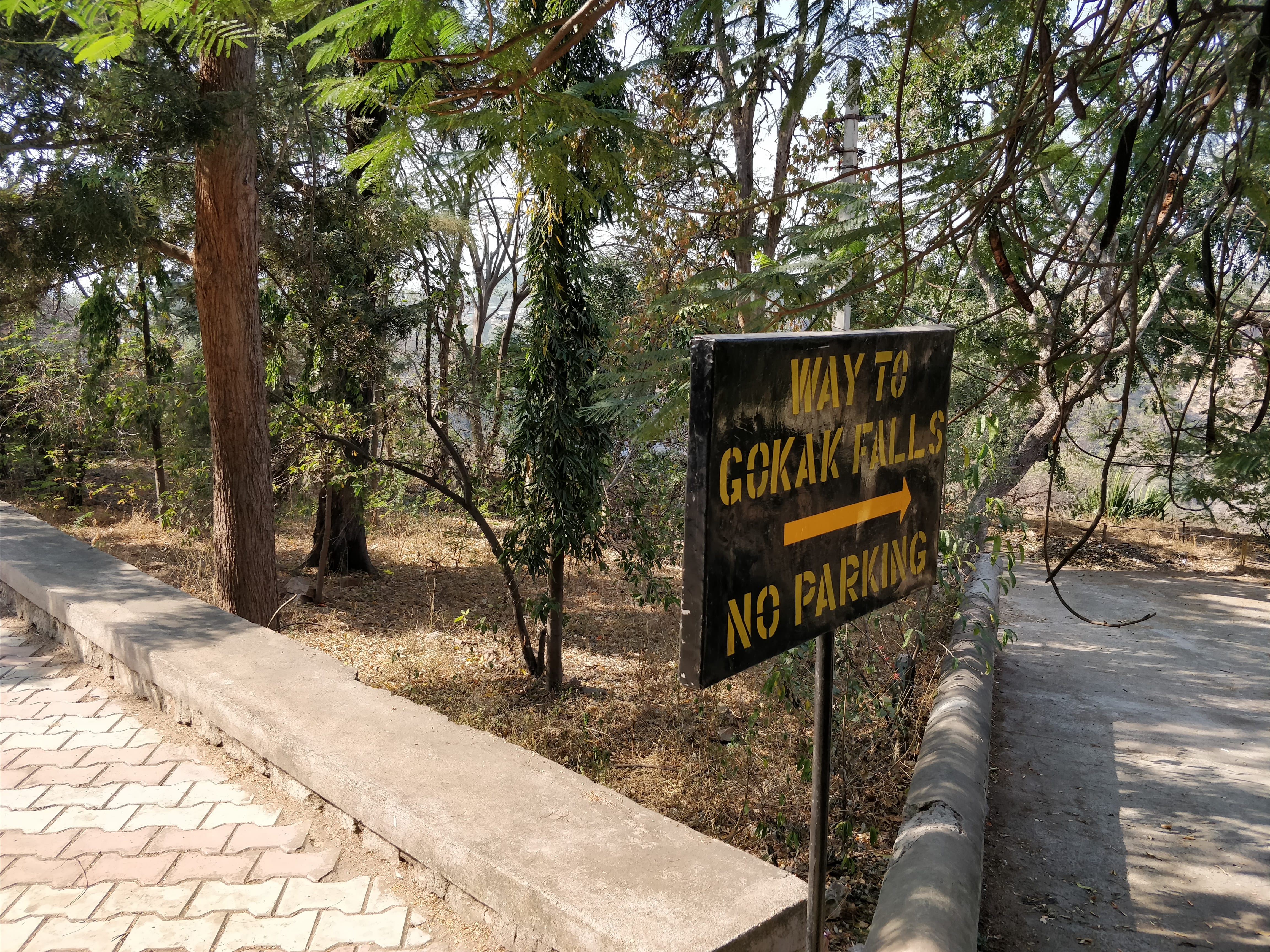 Gokak falls sign board to go to the base of the falls