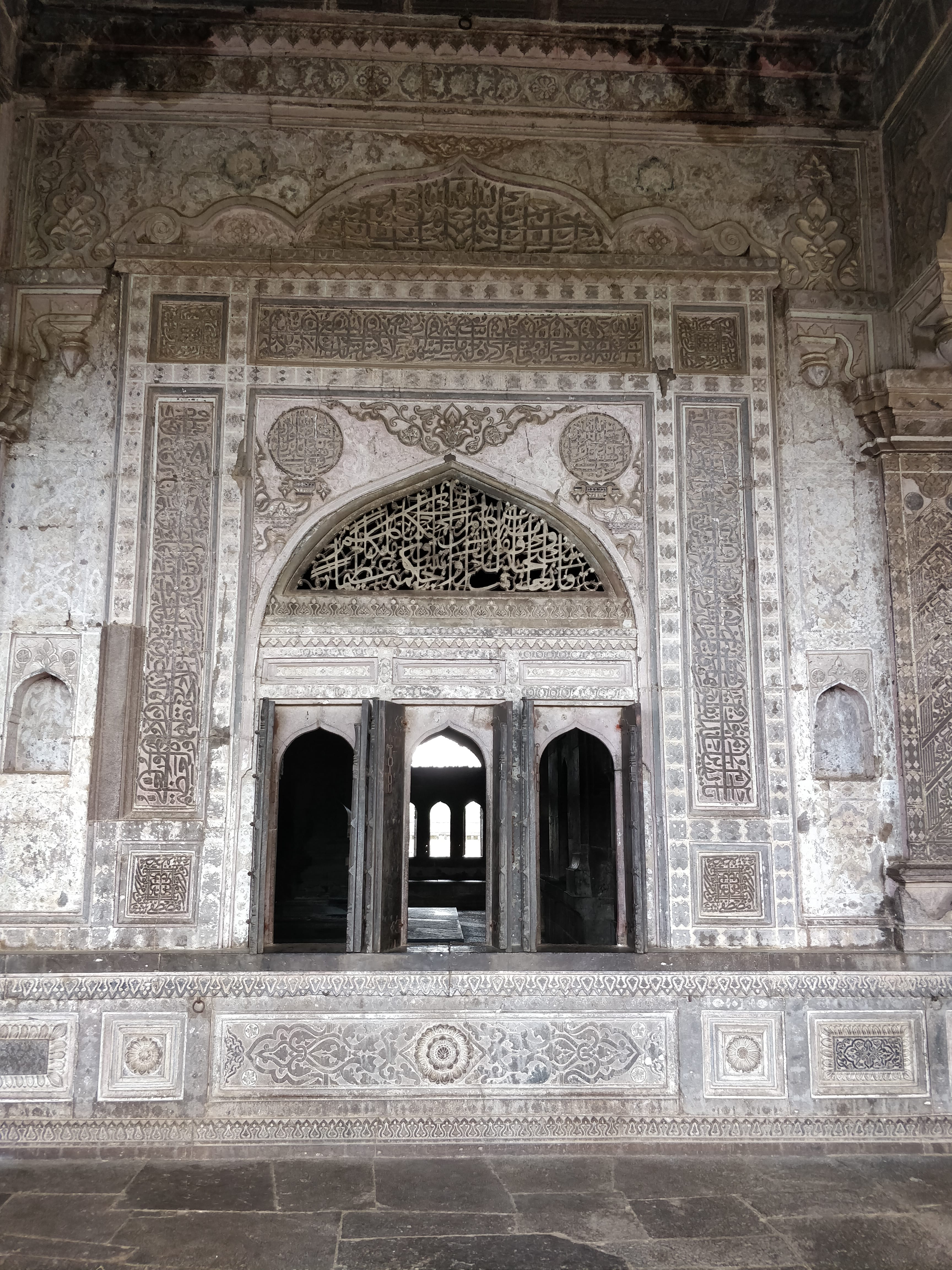 intricate designs on the walls of the tomb