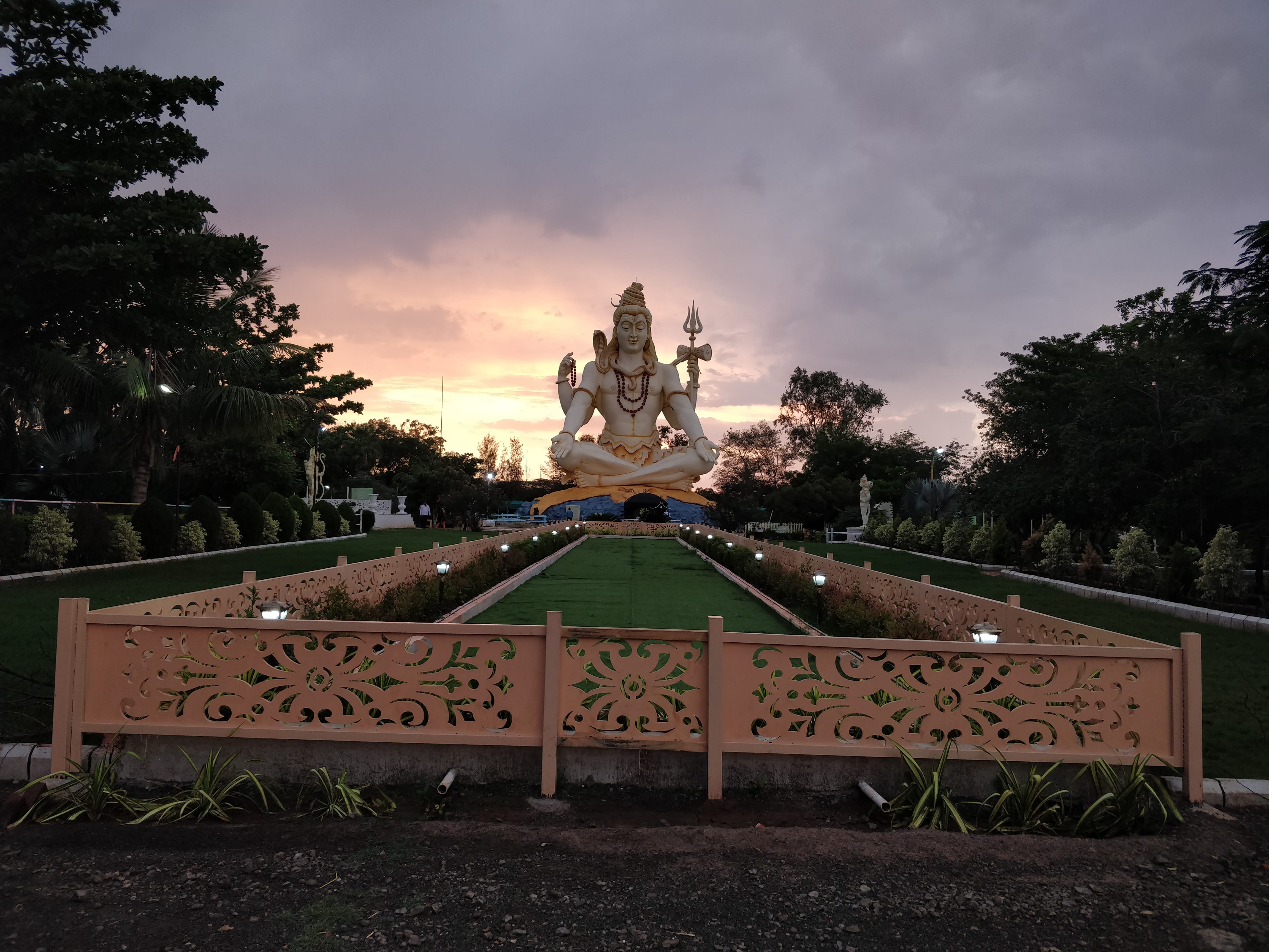 Sunset behind the shiva statue