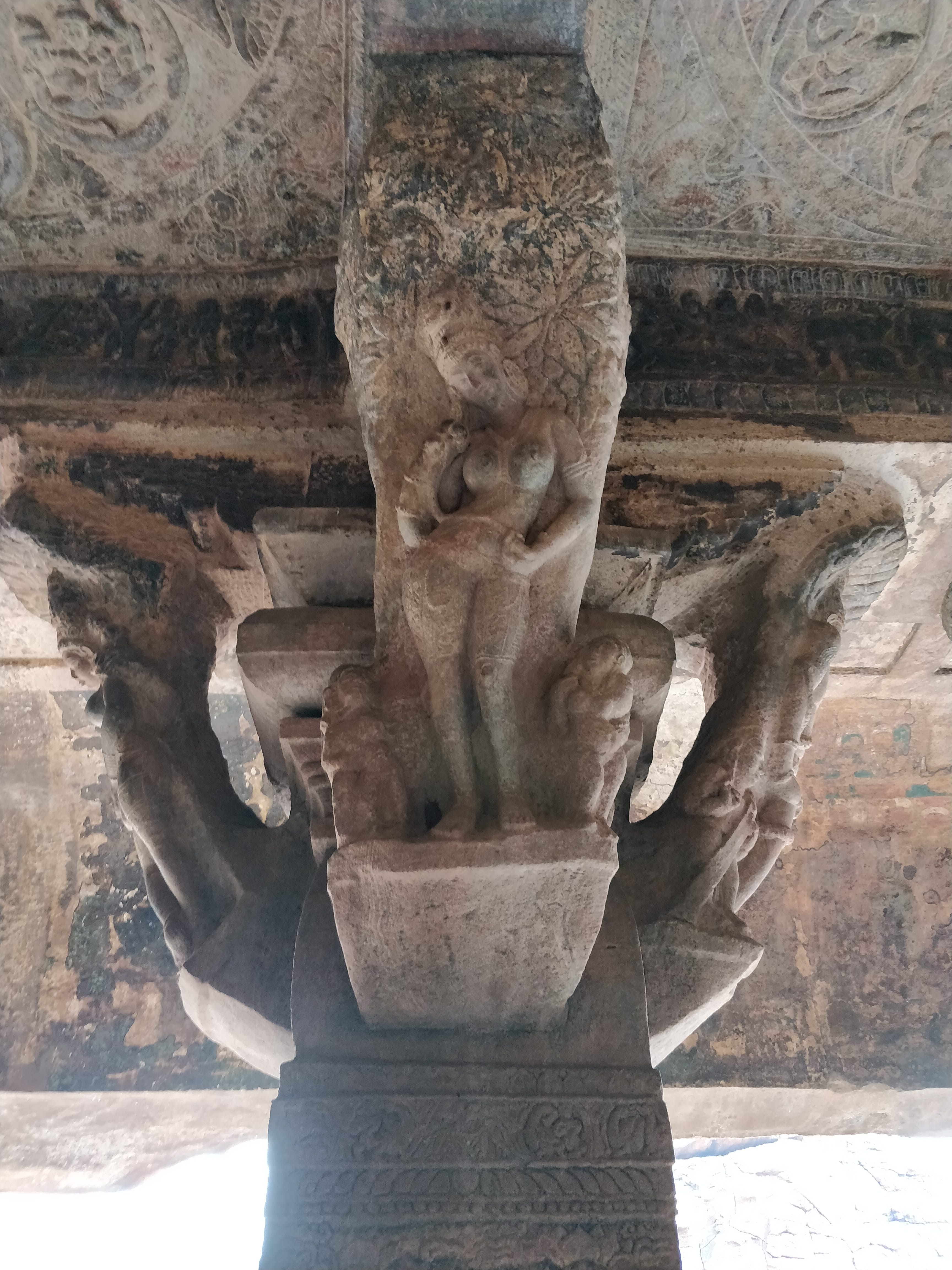 sculpture on top of pillar